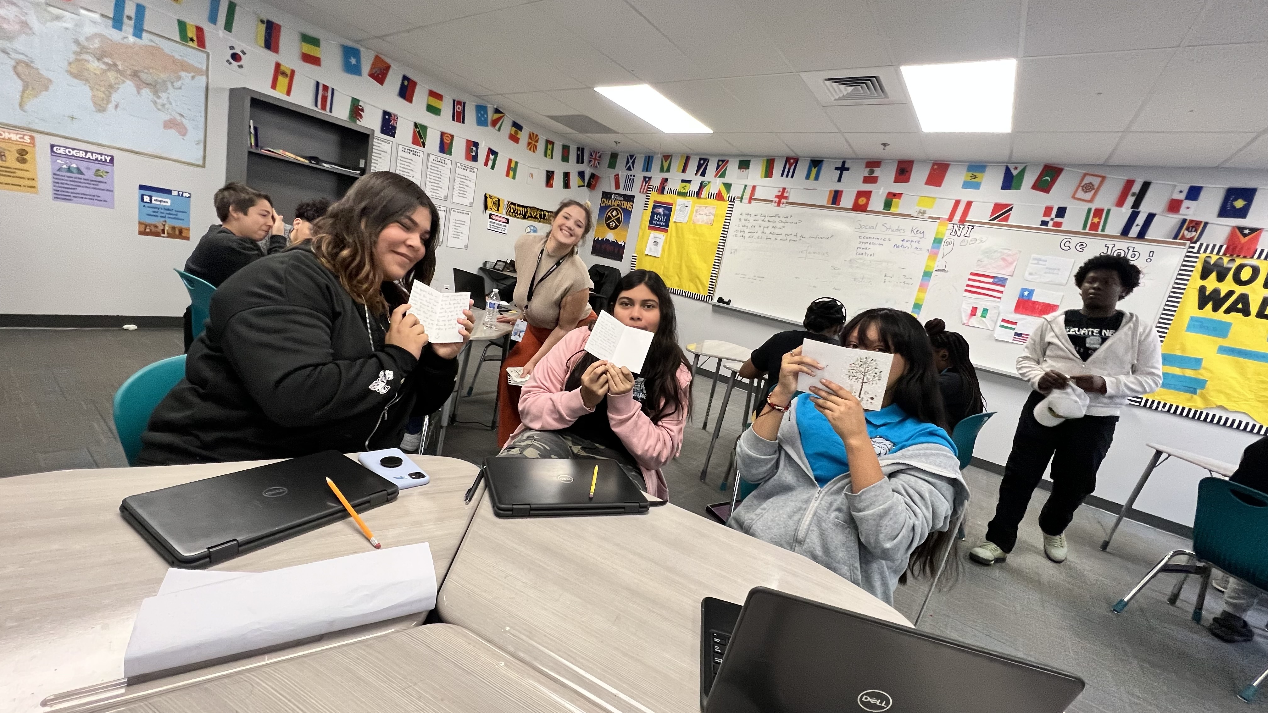 Students participating in community impact initiative